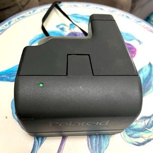 Polaroid instant camera with neck strap